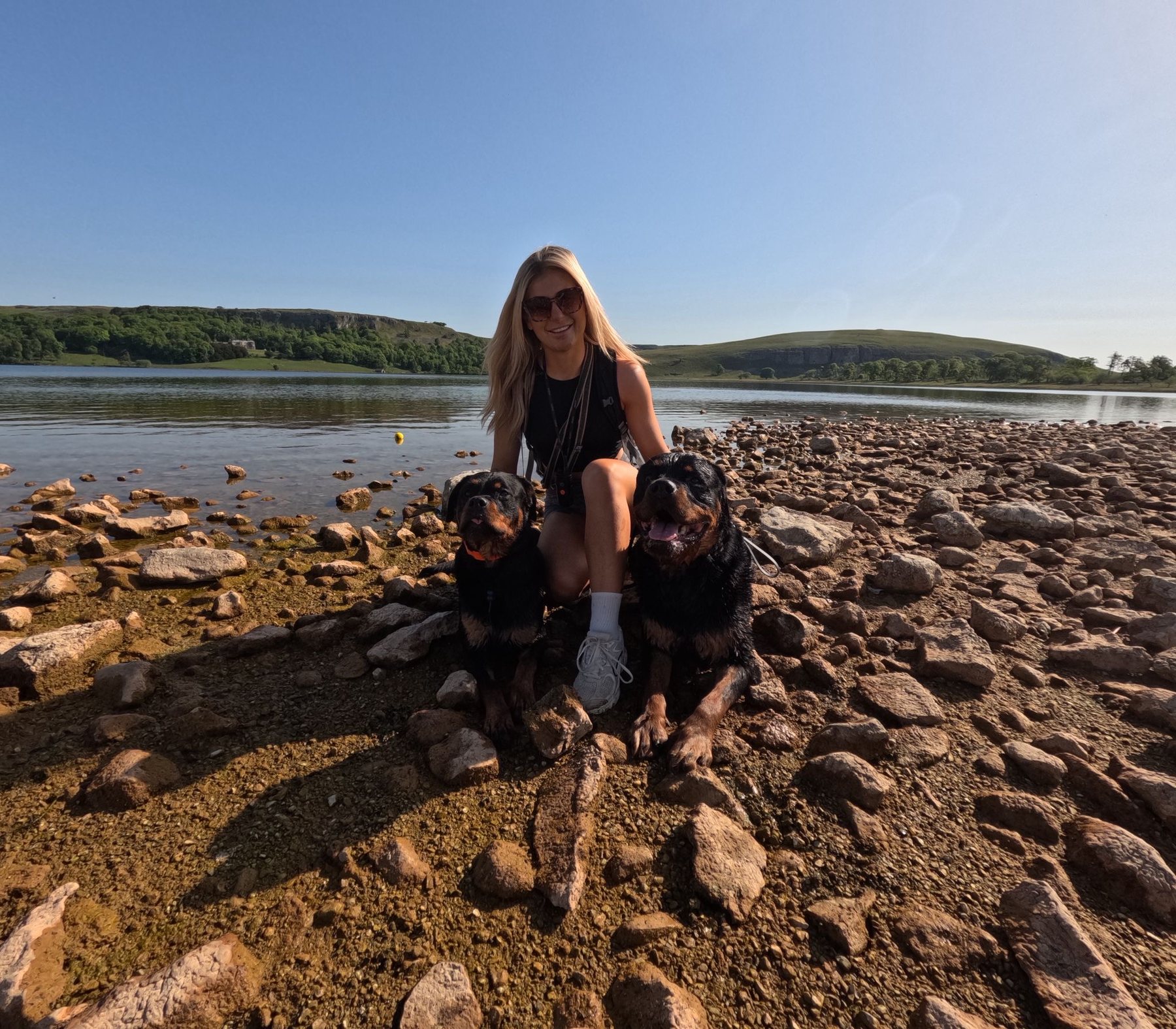 Ellie with dogs by the lake